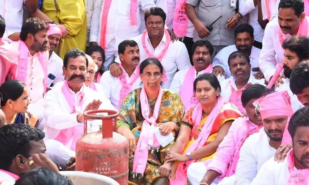 Education Minister Sabitha Indra Reddy along with District ZP chairperson T Anita Harinath Reddy and Maheshwaram former MLA Teegala Krishna Reddy protesting in Rangareddy on Thursday
