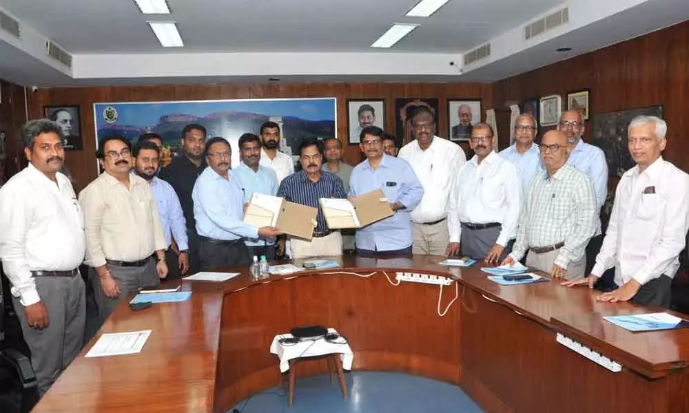 SVU and TCOAP officials exchanging the documents regarding the MoU at SVU VCs chamber in Tirupati on Thursday.
