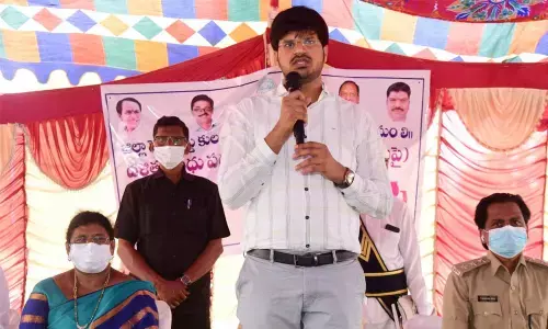 District Collector VP Gautham speaking at an awareness programme on the Dalit Bandhu scheme for the beneficiaries in Khammamon Thursday.