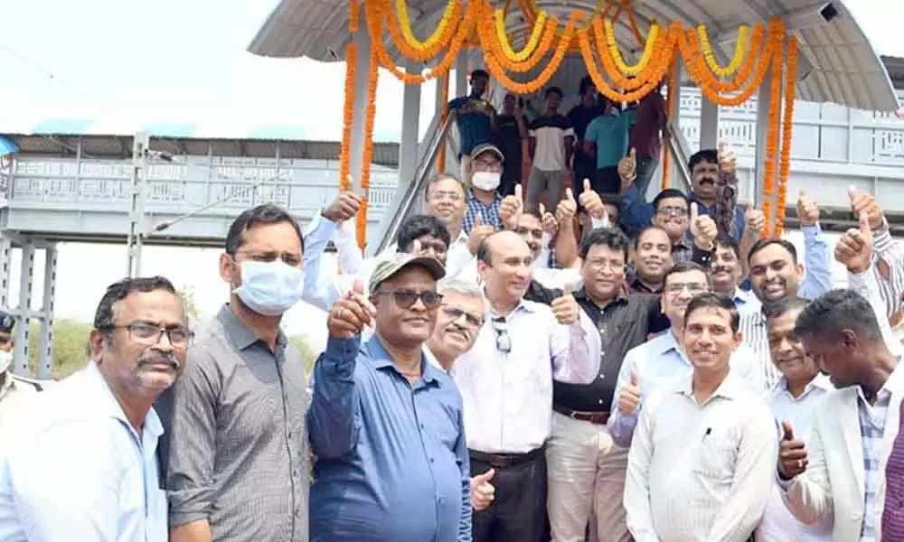 DRM, Anup Satpathy, Jindal Steel Company and railway officials at Naupada railway station after inauguration of FOB