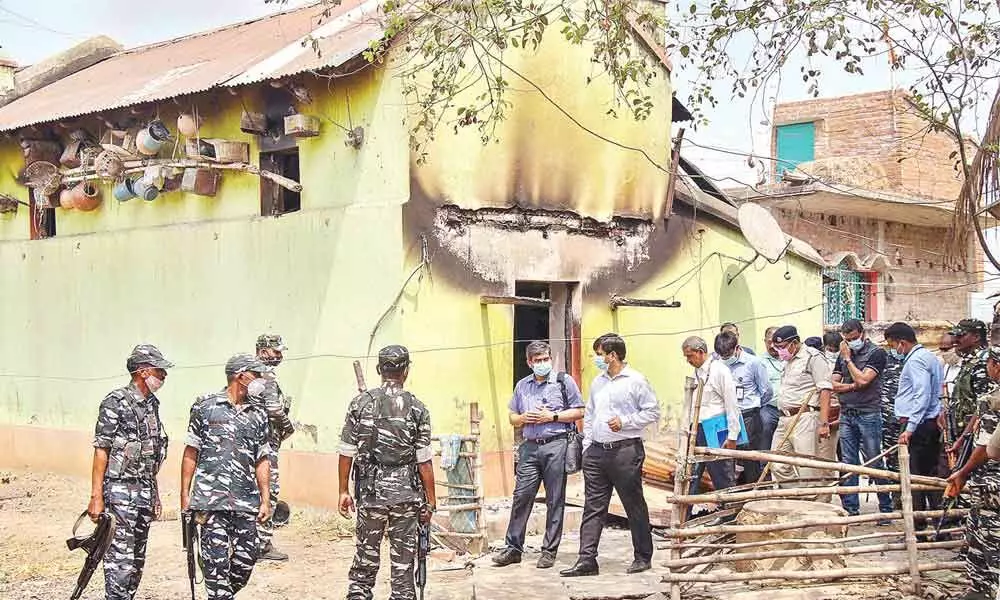 Central Bureau of Investigation (CBI) officers with CFSL team investigate near the house where eight people were burnt alive at Bogtui village in Birbhum district of West Bengal on Saturday
