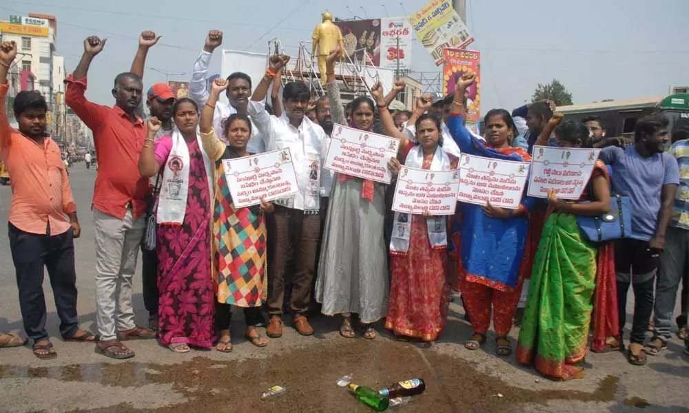 Jana Sena Party leaders staging a protest at Addanki bus stand centre in Ongole on Sunday