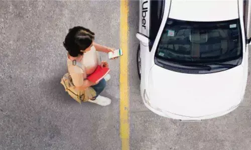 Uber wins 30-month London taxi license