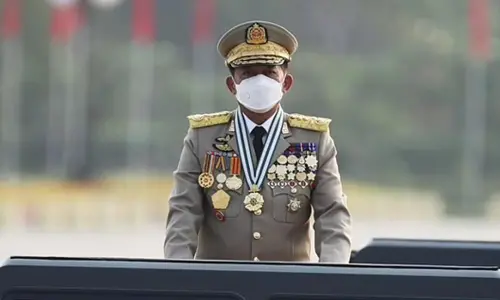 Senior Gen. Min Aung Hlaing, head of the military council, inspects officers during a parade to commemorate Myanmars 77th Armed Forces Day. (Photo | AP)
