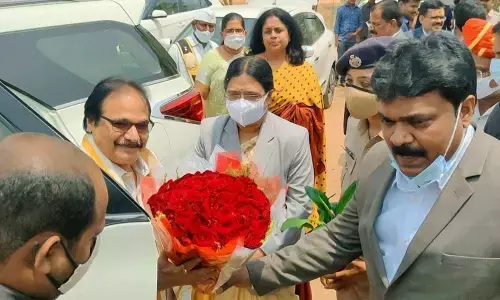 District officials receiving Chief Justice of Andhra Pradesh High Court Prasanth Kumar Mishra at Tripuranthakam  on Sunday