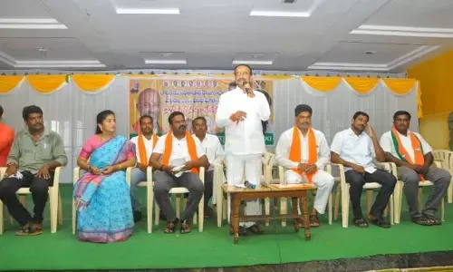BJP MLA Eatala Rajender speaking at a party workers’ meeting in Huzurabad on Monday