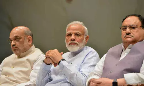 PM Modi with JP Nadda and Amit Shah