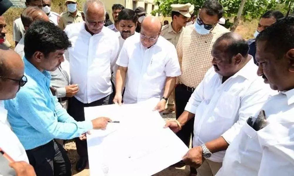Minister G Kamalakar  and others inspecting the site for TTD Sri Venkateswara Swamy Temple  in Karimnagar on Wednesday