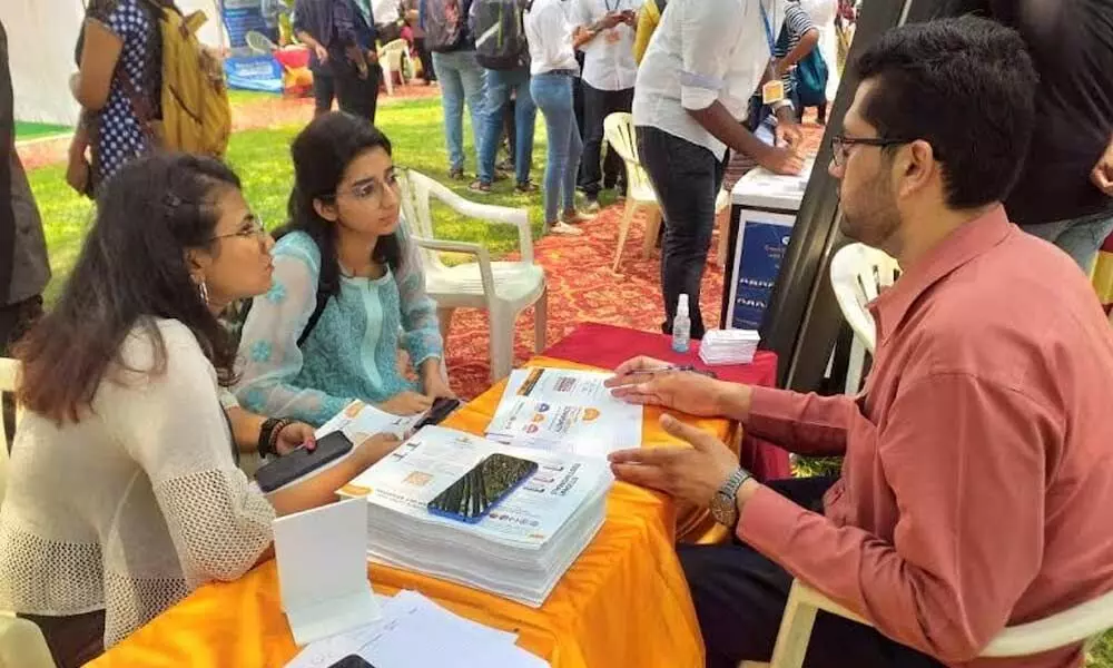 Students taking part in the overseas education fair organised by GITAM in Visakhapatnam on Wednesday