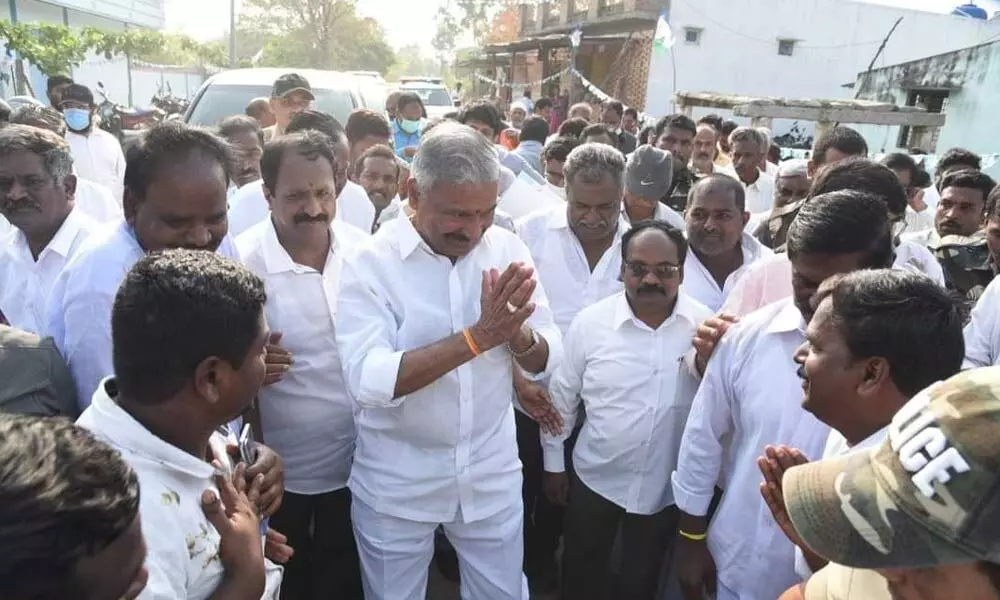 Panchayat Raj Minister Peddireddi Ramachandra Reddy taking part in Palle Baata programme in Somala mandal in Punganur constituency on Wednesday