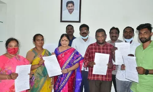 Prakasam ZP Chairperson B Venkayamma handing over appointment orders to the candidates, appointed under compassionate grounds, at her office in Ongole on Wednesday
