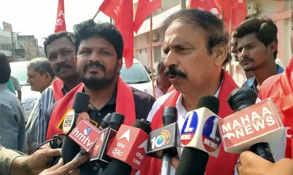CPI State Secretary K. Ramakrishna addressing media persons on the occassion staged protest against hike of power tariff in Kadapa on Thursday