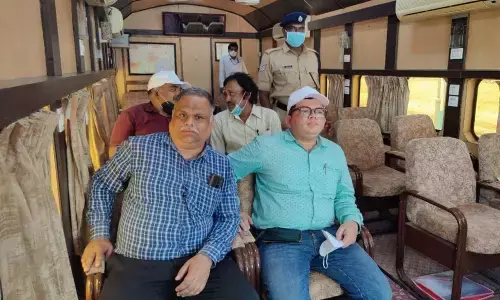 SCR DRM Sarath Chandra along with railway officials conducting the trial on the electrified railway line in Bodhan on Thursday