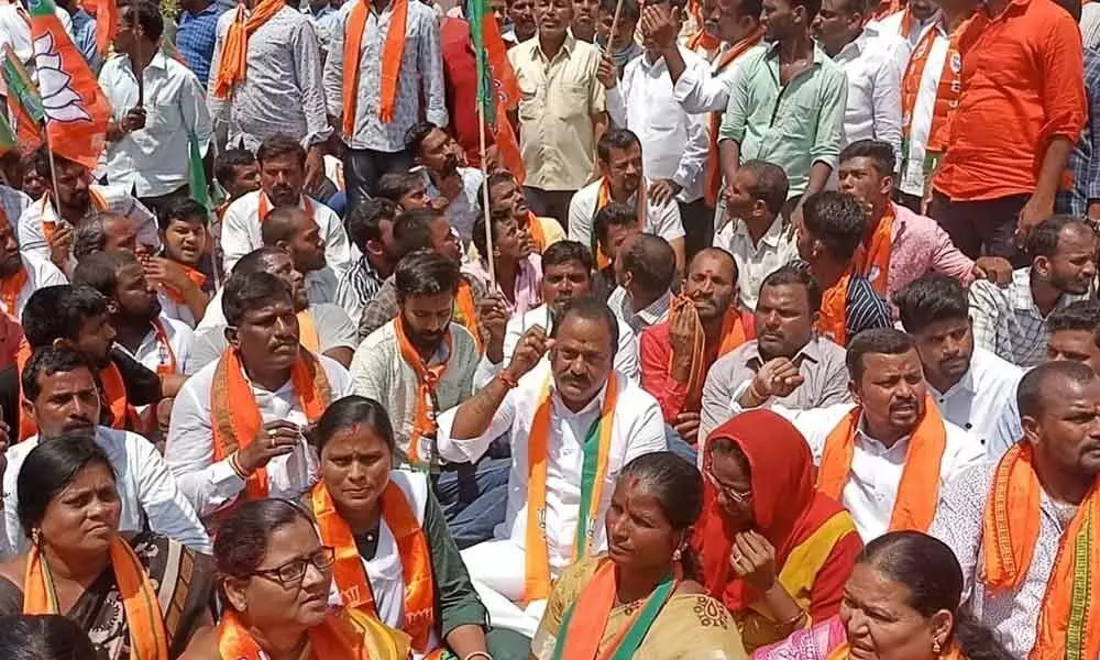 BJP workers try to occupy 2BHK houses