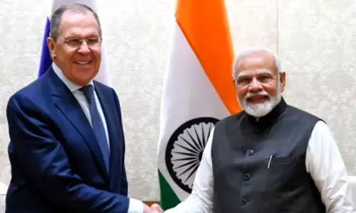 Russian Foreign Minister Sergey Lavrov and Indian Prime Minister Narendra Modi