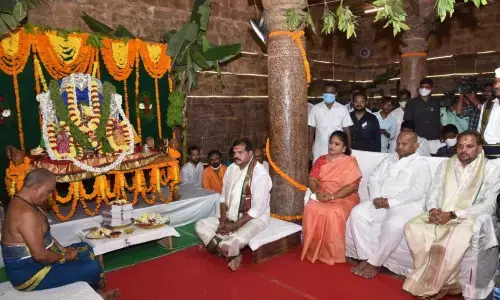 Minister Botcha, collector A Suryakumari and ZP Chairperson Chinna Srinu performing puja on Saturday