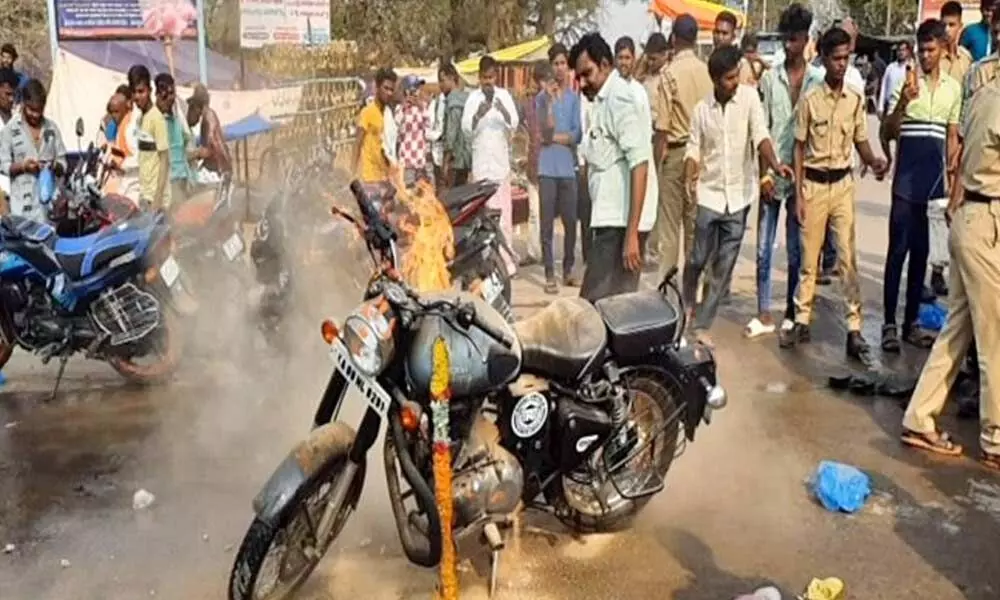 Bike catches fire at a temple in Kasapauram of Anantapur