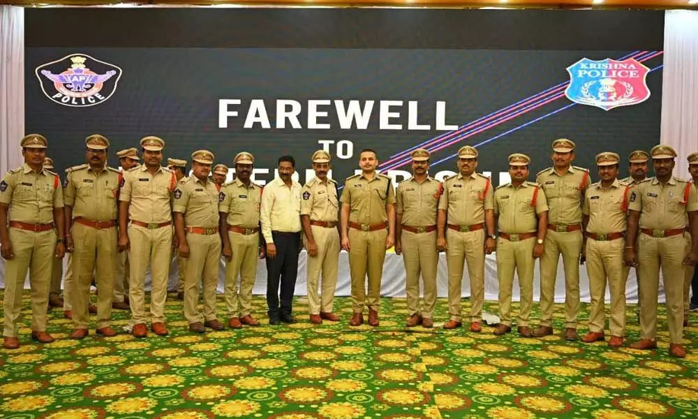 Krishna district SP Siddharth Kaushal with the transferred police officers at a farewell programme in Machilipatnam on Sunday