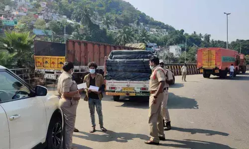 RTO officials conducting vehicle checks in Visakhapatnam on Sunday