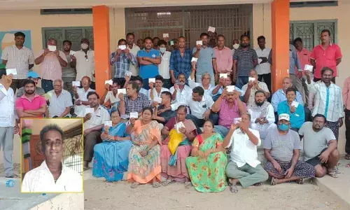The victims of chit organiser Narahari Harikrishna discussing future course of action at a school in Chinaganjam on Sunday