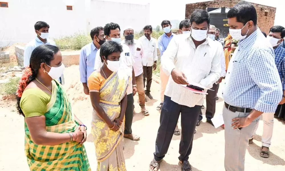Chittoor Collector M Hari Narayanan inspecting the progress of construction  works at Jagananna Colony near  Chowdepalli on Wednesday.