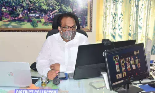 District Collector S Venkat Rao interacting with officials on spreading awareness on free coaching to SC candidates provided by the State government in Mahbubnagar on Wednesday