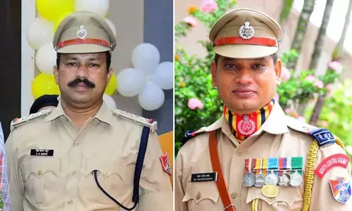 Inspector TSCS Reddy and ASI Sk Nayeem Basha