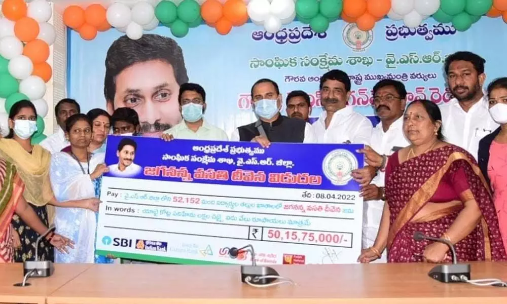District Collector V Vijaya Rama Raju handing over the replica of cheque to beneficiaries of JVD in Kadapa on Friday.