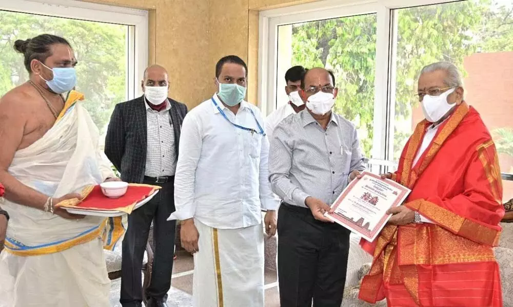 Dr R Ramana Prasad, TTD Deputy Executive Officer and Executive Officer of Sri Kodandarama Swamy temple inviting Governor Biswabhusan Harichandan for the Sita Rama Kalyanam at Vontimitta, at Raj Bhavan in Vijayawada on Friday