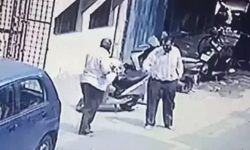 The CCTV image shows the argument between Arpit (right) and his father.