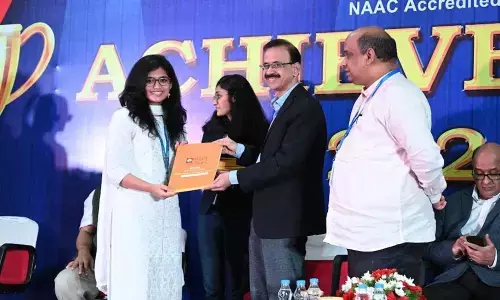 Students who got selected in campus recruitment receiving offer letters on Achievers Day held at GITAM on Friday
