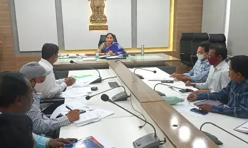 District Collector K Madhavi Latha attending a videoconference with the officials in Rajamahendravaram on Friday