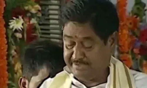 Dharmana Prasada Rao taking oath as Cabinet minister