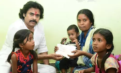 Jana Sena president Pawan Kalyan on Tuesday during a visit to the house of a tenant farmer who committed suicide in Anantapur district. He handed over financial support of Rs one lakh to the bereaved family.