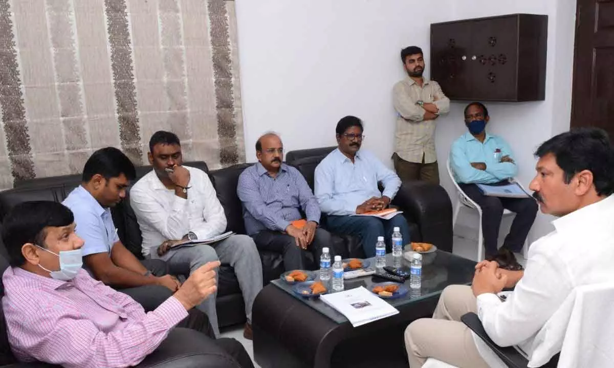 Minister for housing Jogi Ramesh reviews the progress of housing schemes with officials in Vijayawada on Wednesday