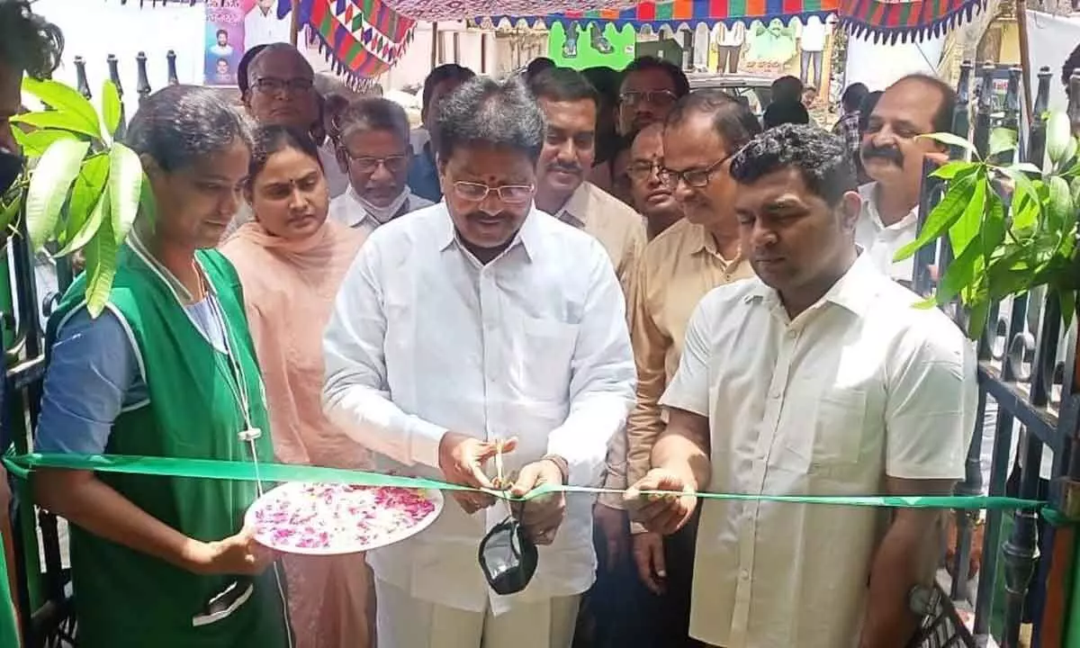 DCCB Chairman Akula Veerraju and Joint Collector Ch Sridhar inaugurating paddy procurement centre at Torredu village on Wednesday