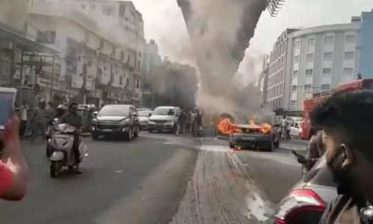 Moving car catches fire