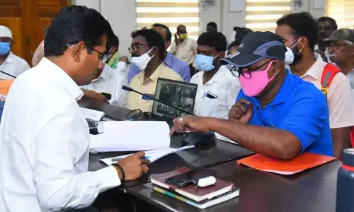 Prakasam District Collector AS Dinesh Kumar listening to the pleas of SCs and STs during a special Spandana programme in Ongole on Wednesday