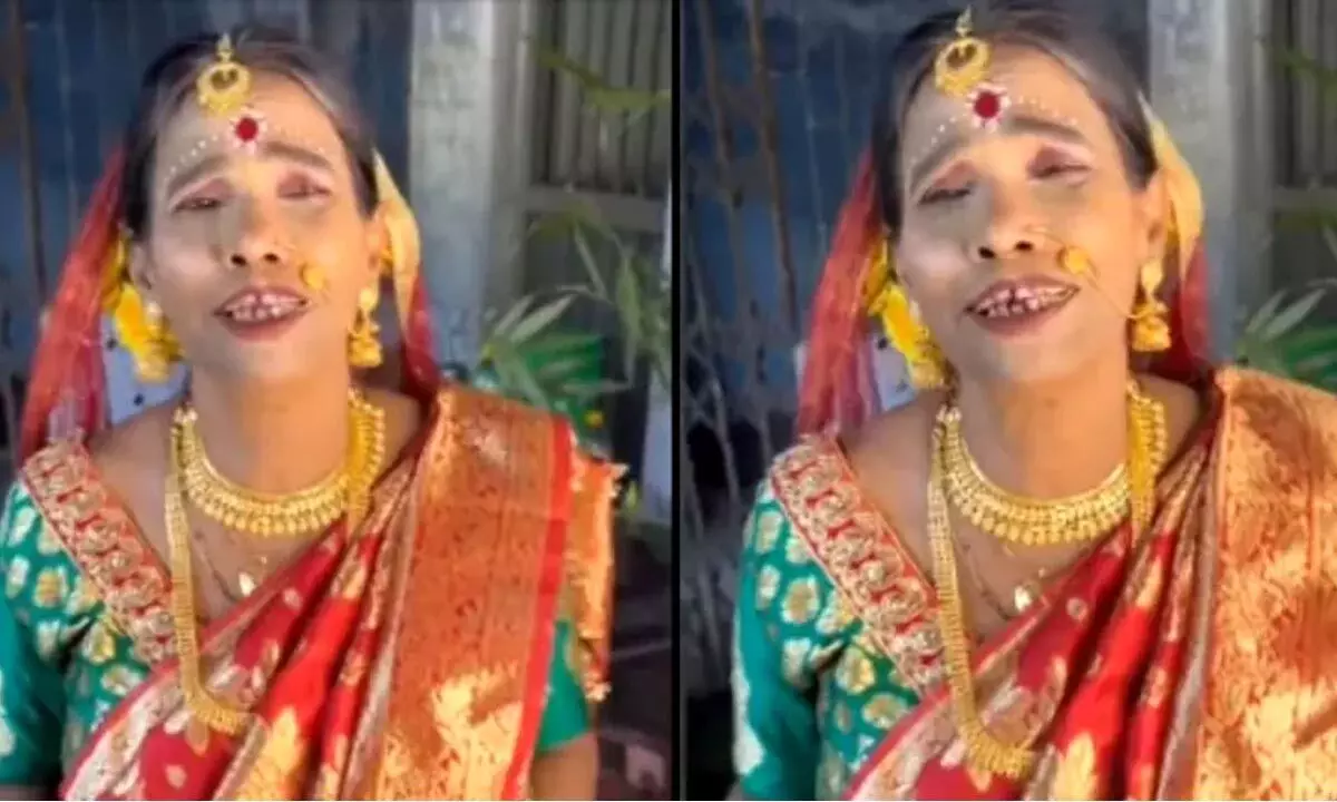 This video of Ranu Mondal dressed as bride and singing Kacha Badam is going viral.
