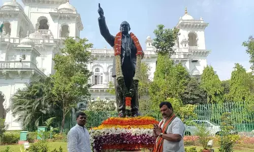 BJP leader Dr Ponguleti Sudhakar Reddy paying tributes to Dr BR Ambedkar in Hyderabad on Thursday