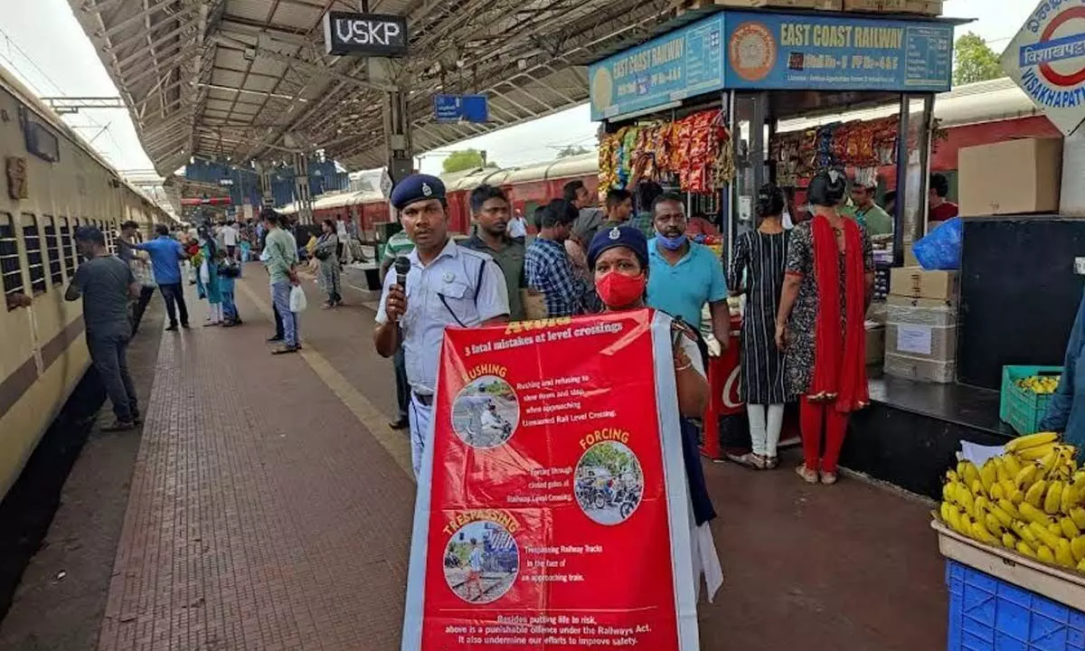 Railway staff conducting an awareness drive at Waltair division on Friday