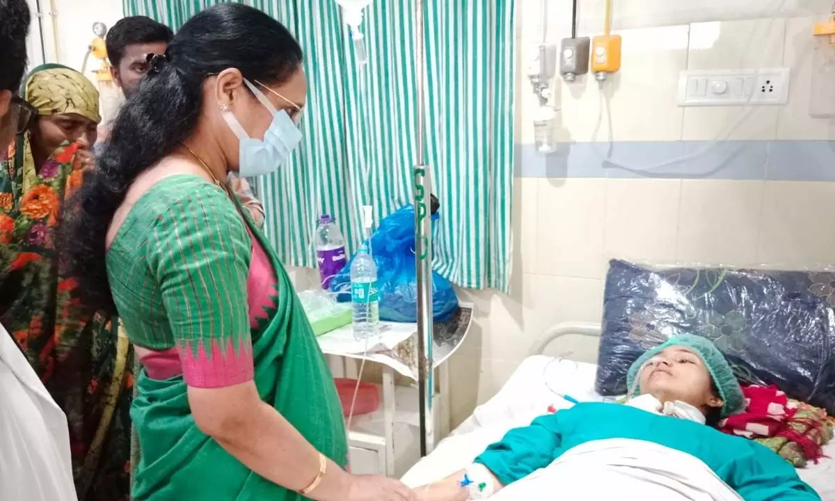 AP Mahila Commission chairperson Vasireddy Padma consoling Sk Fathima at GGH in Guntur on Friday