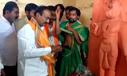 Eatala Rajender offers puja on Hanuman Jayanthi