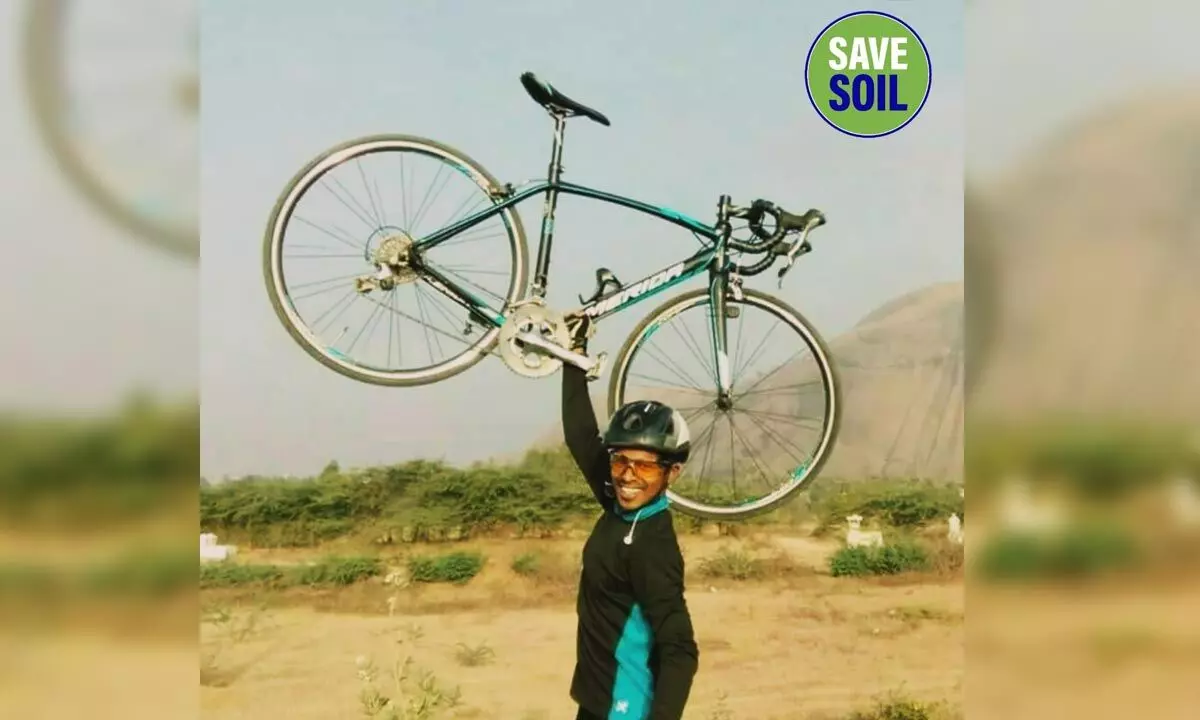 Cyclist participates in awareness programme on soil conservation