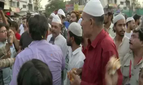 Muslims shower petals during Hanuman Jayanti