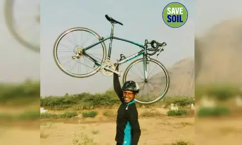 Cyclist participates in awareness programme on soil conservation