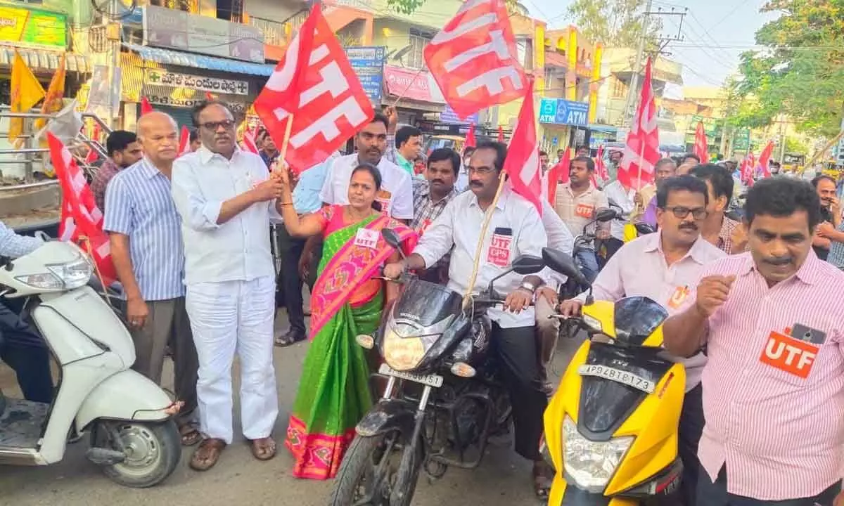 MLC  Y Srinivasulu Reddy flags off the bike rally organised by UTF in Madanapalle on Monday