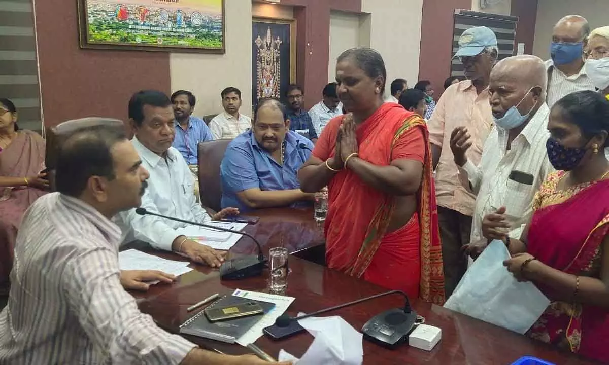 Deputy Commissioner Chandramouleeswar Reddy receiving complaints from public during Spandana at the Municipal Office in Tirupati on Monday.