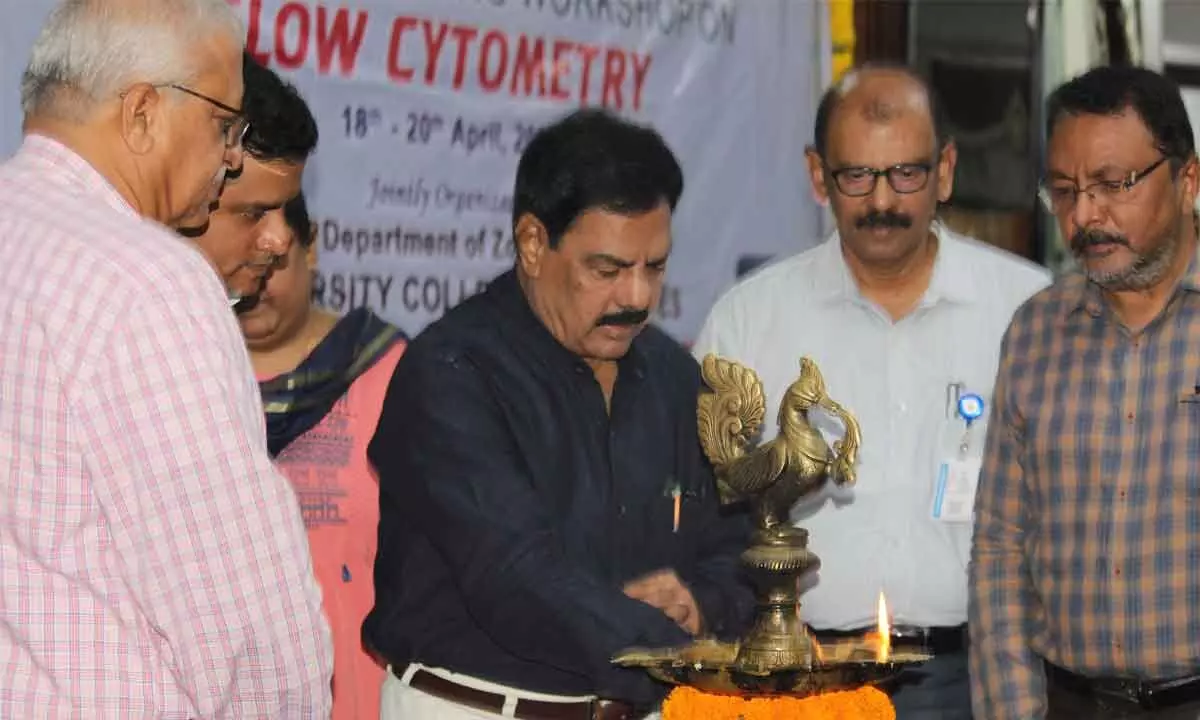 SVU V-C Prof K Raja Reddy lighting the lamp to mark the beginning of a workshop at  SV University in Tirupati on Monday. Rector Prof V Srikanth Reddy, Registrar Prof O Md Hussain and others are also seen.