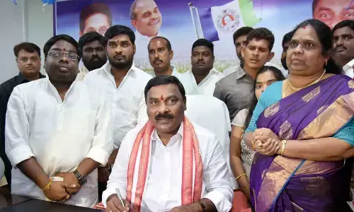 Merugu Nagarjuna taking a charge as minister for social welfare  at the Secretariat on Monday